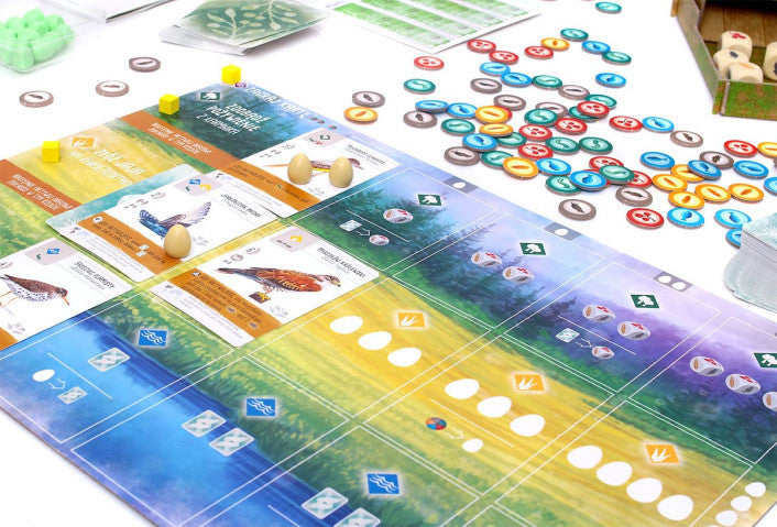 Wingspan board game box with bird cards and dice set