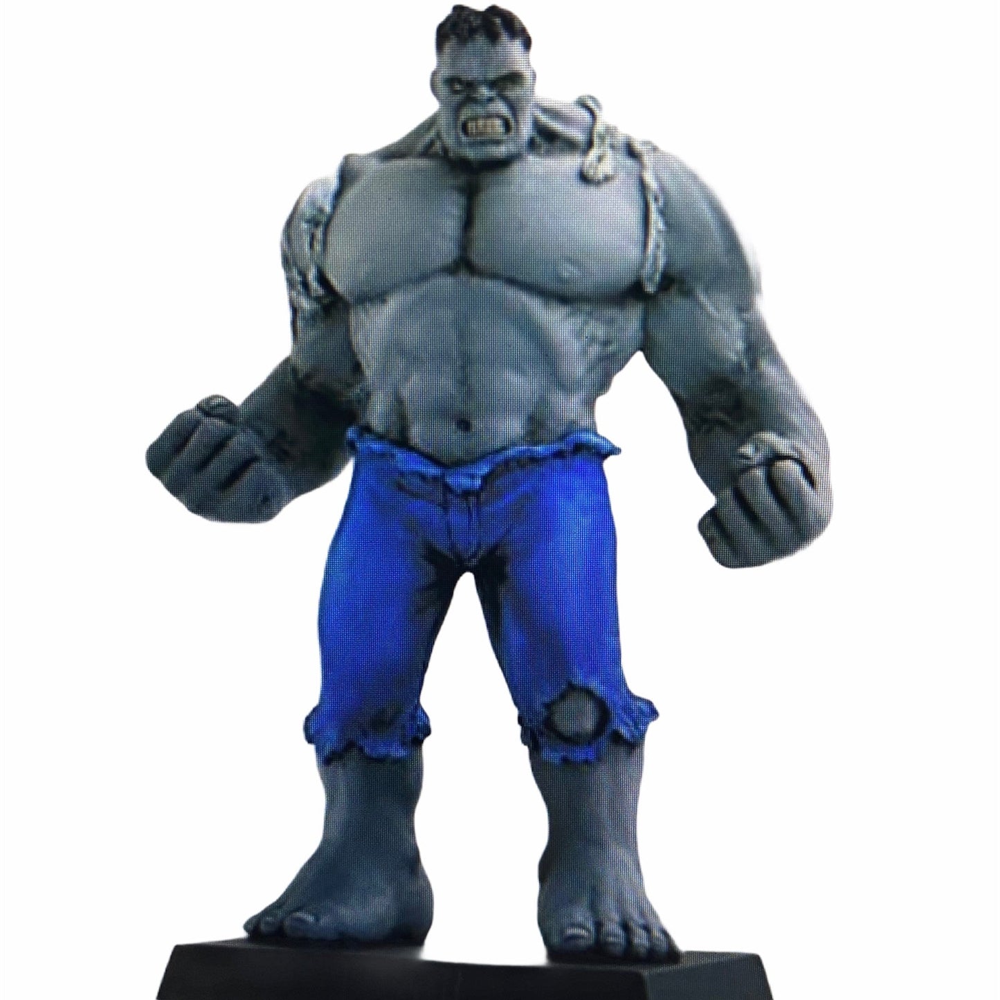 Grey Hulk action figure Marvel collectible on white shelf